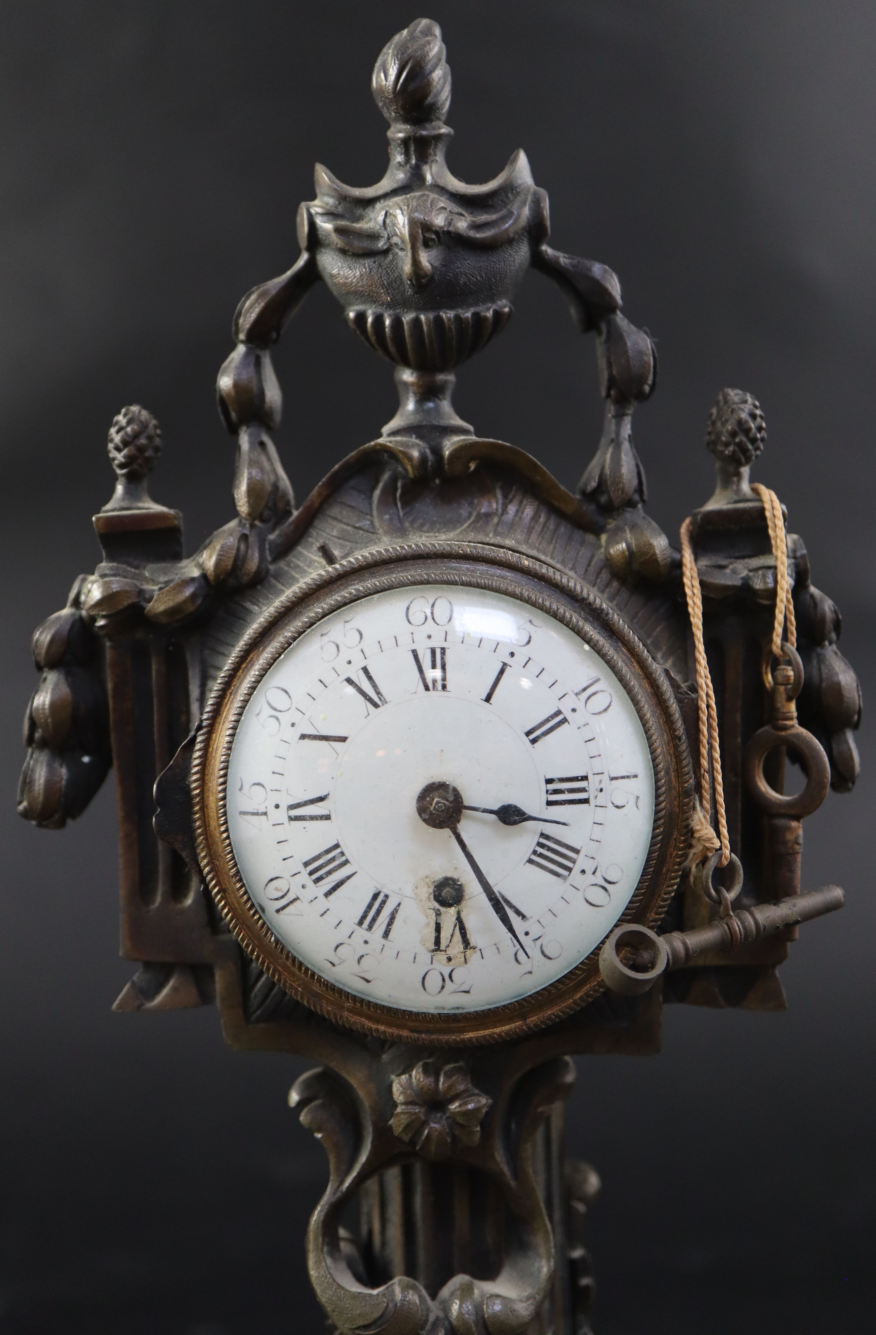 A late 18th century French marble and bronze mantel timepiece, height 30cm